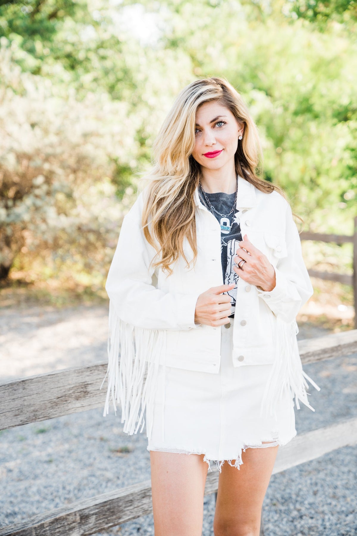 White fringe denim jacket styled at the ranch