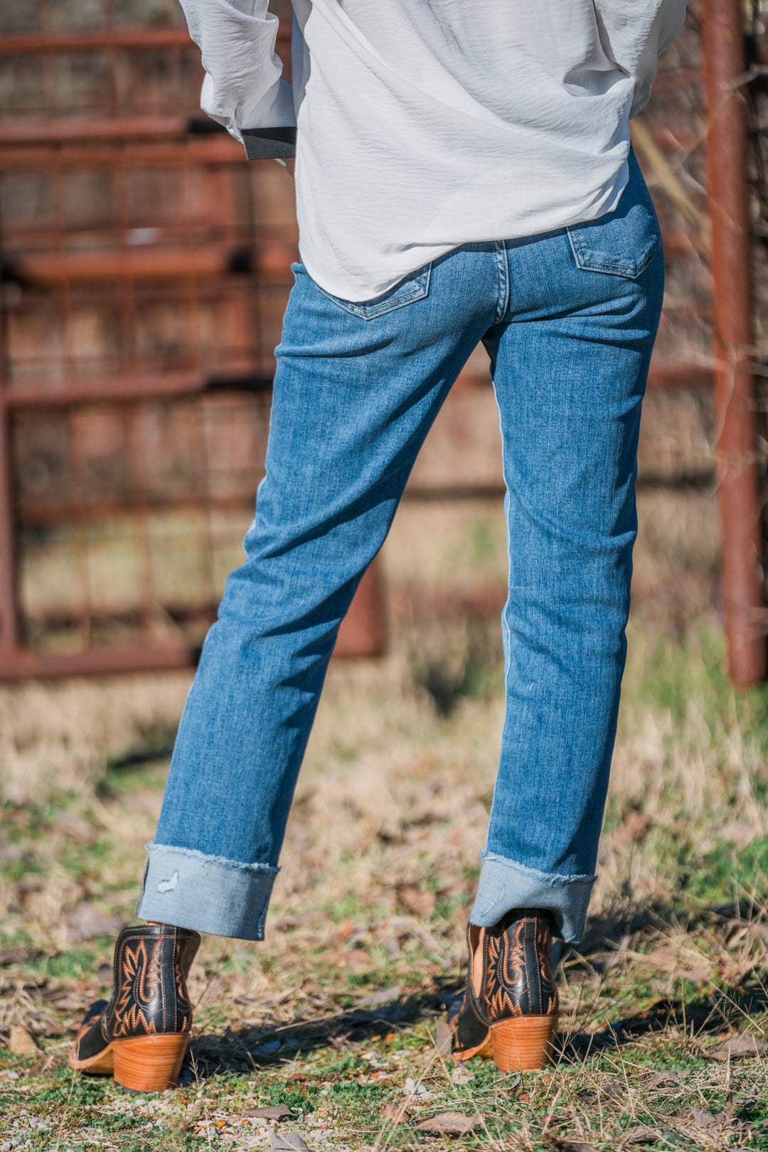 Cuffed ankle jeans back view