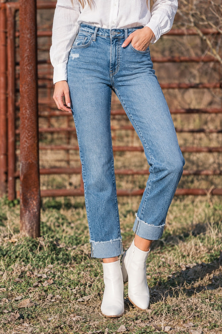 Golden Hour cuffed ankle jeans with white booties