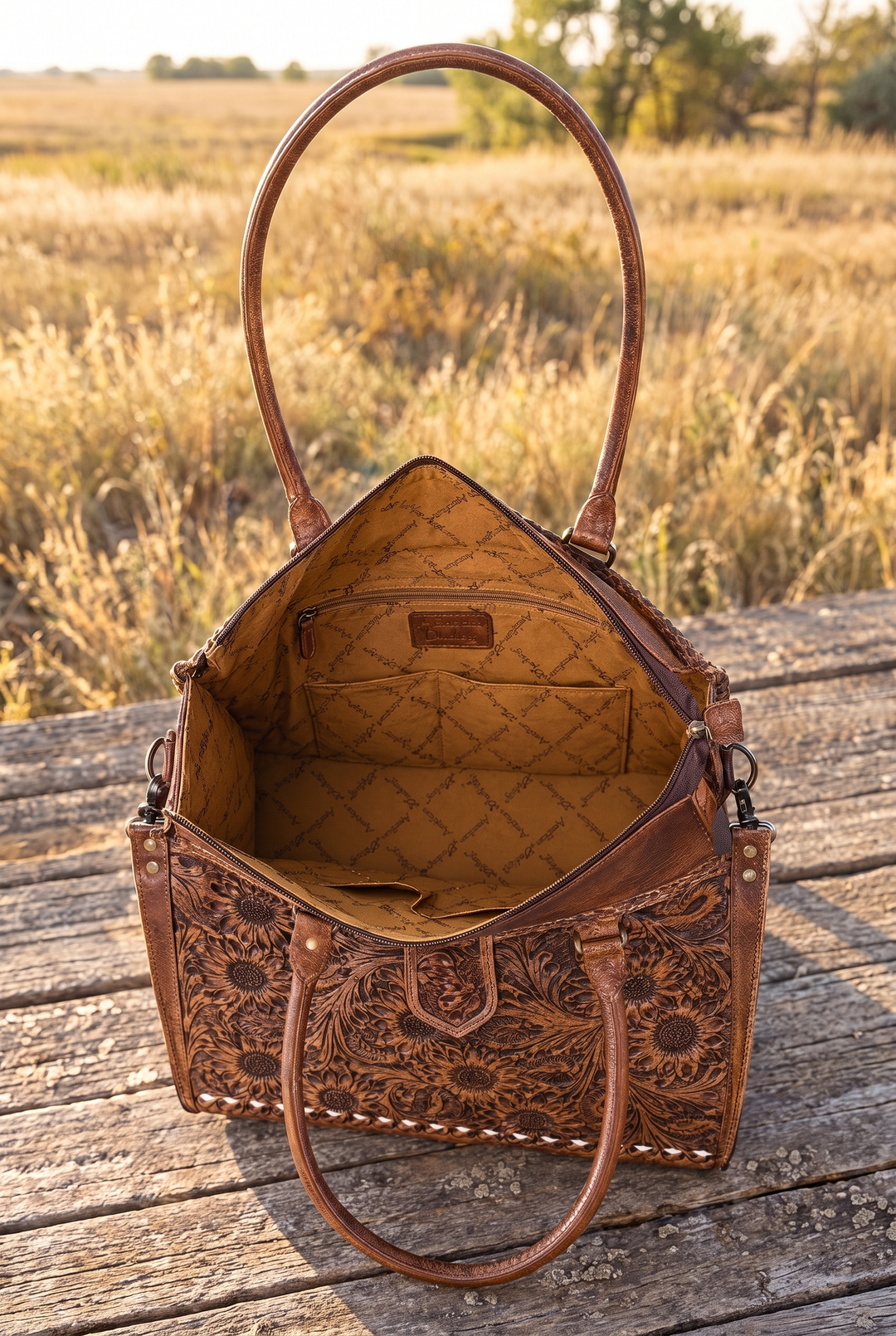 Inside of the Sunflower Fields tooled leather tote showing lining and pockets