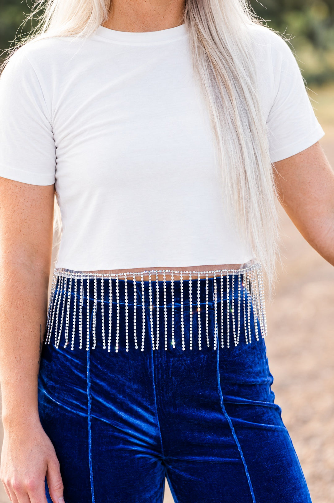 White crop top rhinestone fringe hem detail