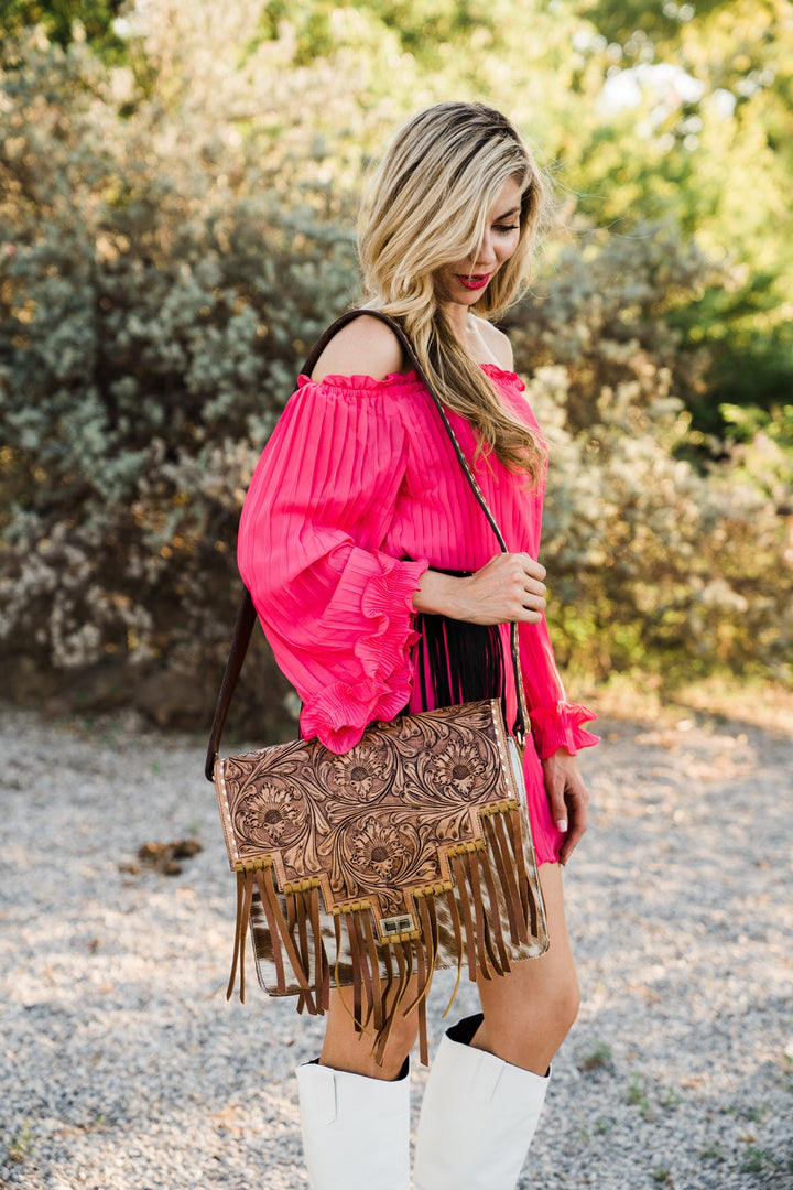 Rodeo Rose tooled fringe crossbody worn
