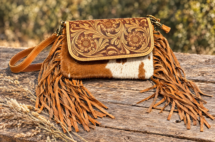 Scabulous crossbody on a wood table outdoors