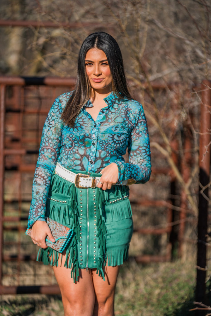 Turquoise button up top styled with jade fringe skirt