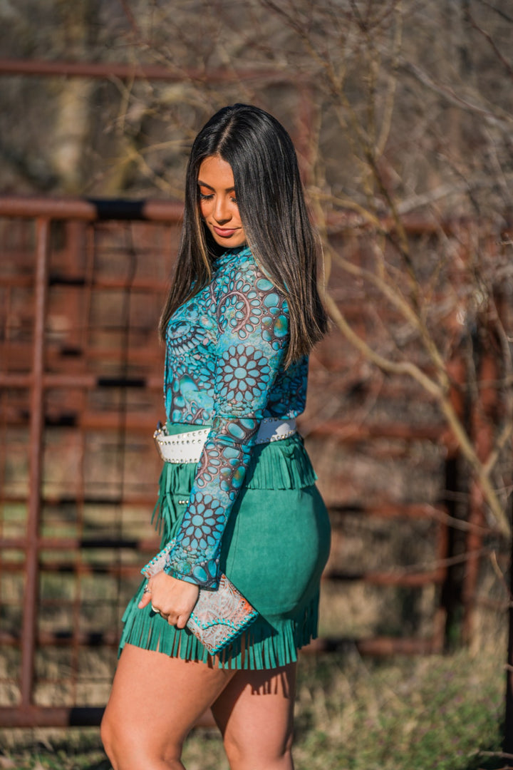 Turquoise button up top side view