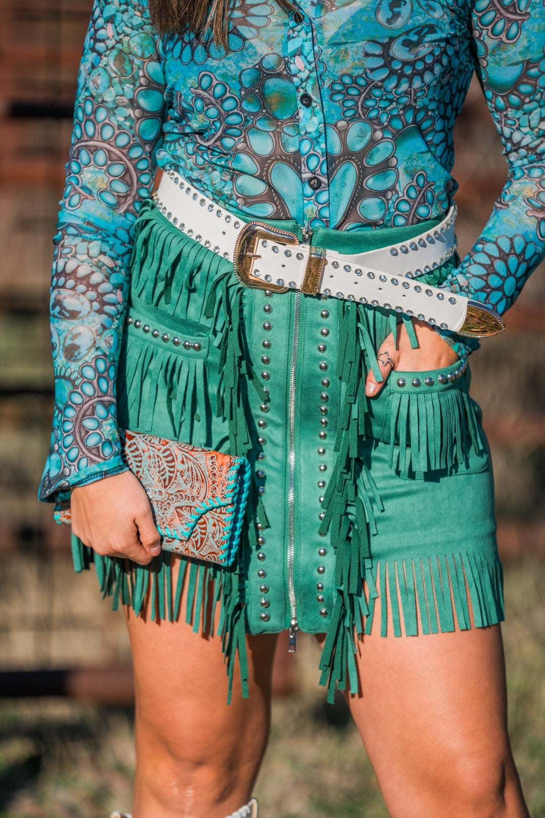 Turquoise button up top print detail
